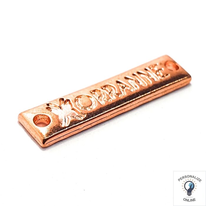 Etiqueta-personalizada-baixo-relevo-2.0-a-2.5-cm-em-metal-500-unidades-com-furos-rose.jpg
